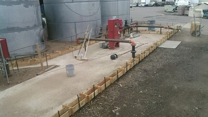 Concrete slab pump setup at a commercial site